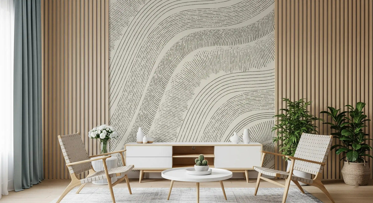 Neutral line mural in a living room with a white console and cane chairs GD12473