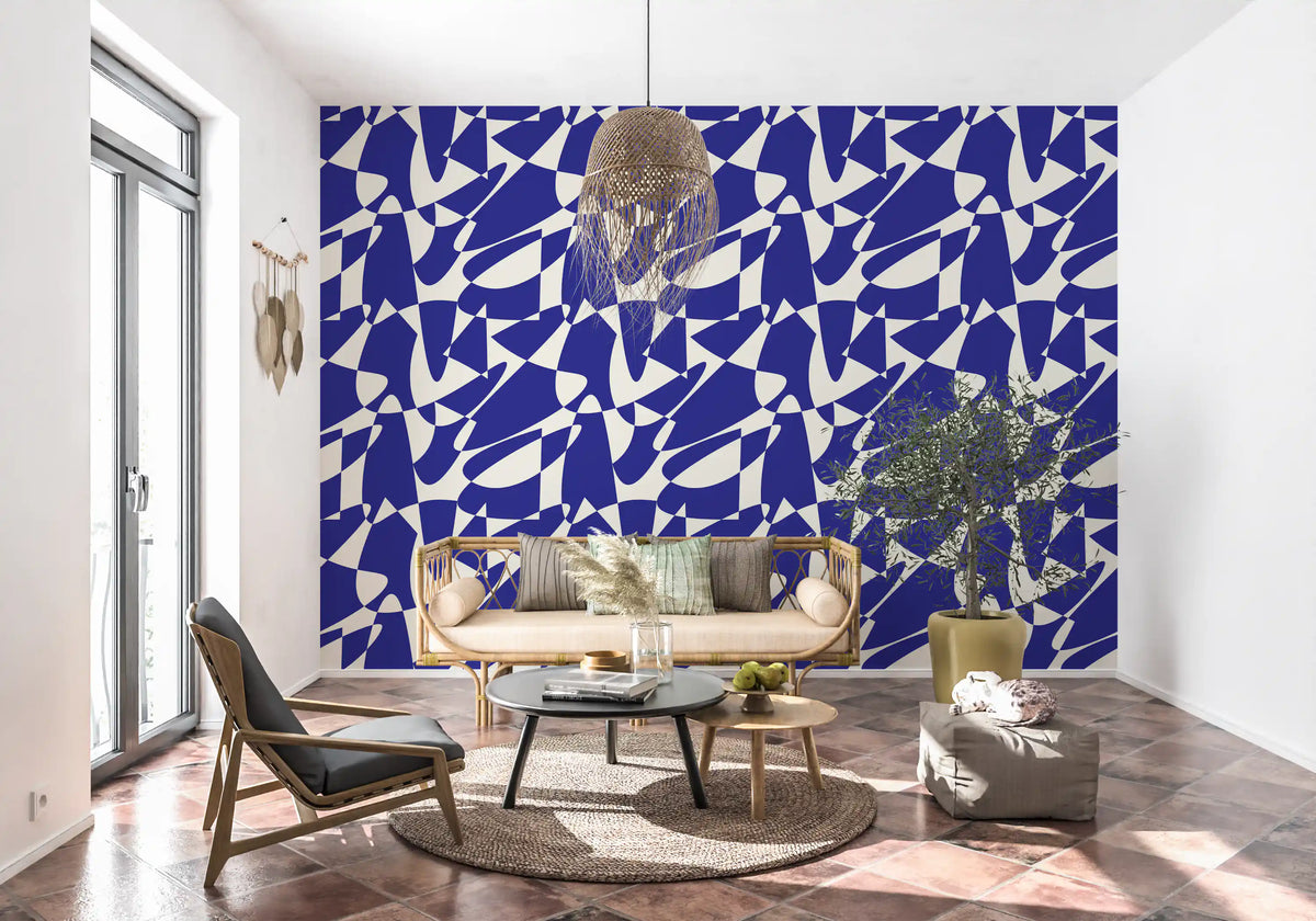 Blue shape wallpaper in a living room with a dark chair and terracotta floor GD12480