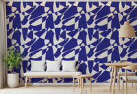 Blue shape wallpaper in a living room with a wood bench and dining chairs GD12480