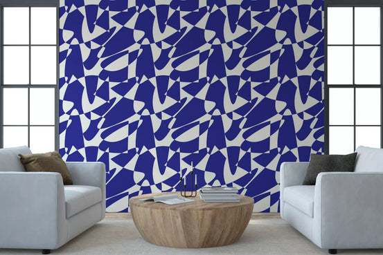 Cobalt shape wallpaper in a living room with pale grey armchairs GD12480