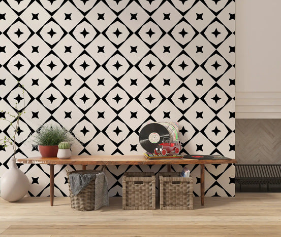 Black and cream star grid wallpaper behind a wooden console table with plants and vinyl records GD12482