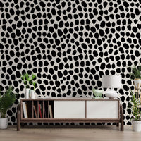 Playful black dot wallpaper in a bright dining nook GD12487