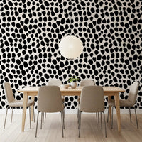 Ink blot texture wallpaper feature wall in a modern living room with white sofa GD12487