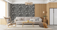 Monochrome ink blot wallpaper accent wall in a calm bedroom GD12487