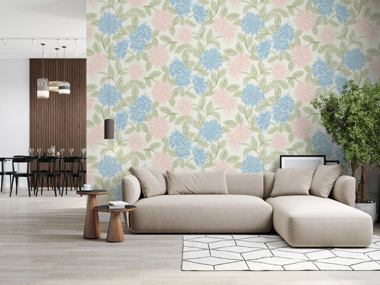 Living room with plant styled in blue and pink watercolour hydrangea wallpaper and a teal sofa GD12644