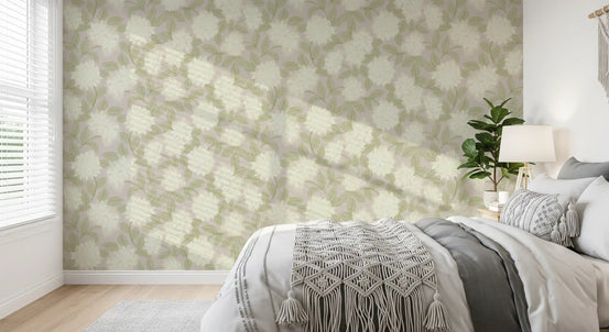 Bedroom feature wall in cream and sage leaf motif wallpaper with neutral bedding GD12647