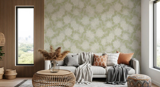 Cosy living room in white bloom botanical wallpaper with a grey sofa and rattan table GD12649
