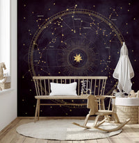 Purple and gold constellation mural in a nursery with a wooden bench and cot GD12716