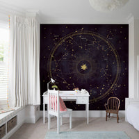 Gold constellation mural above a white study desk in a kids room GD12716