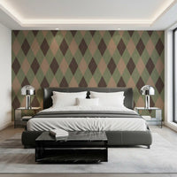 Argyle harlequin wallpaper behind a dark grey bed in a bedroom GD12722