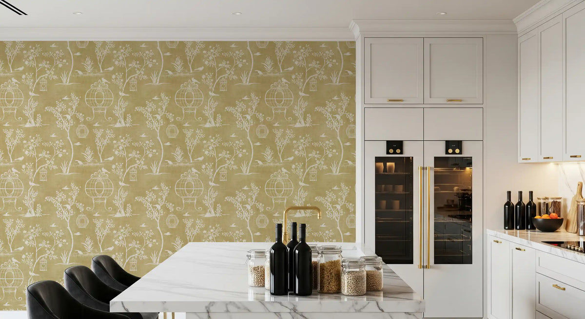 Mustard chinoiserie garden wallpaper in a bright kitchen with a marble island GD12755