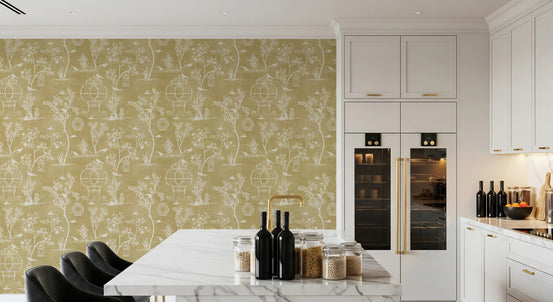 Mustard chinoiserie garden wallpaper in a bright kitchen with a marble island GD12755