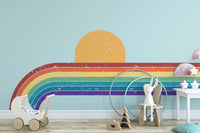 Colorful rainbow mural with a sunset vibe
