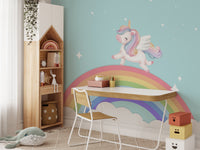 Rainbow unicorn mural wallpaper creating a fantasy world.
