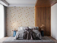 Beige blush wallpaper detail with rounded caramel polka dot squares.