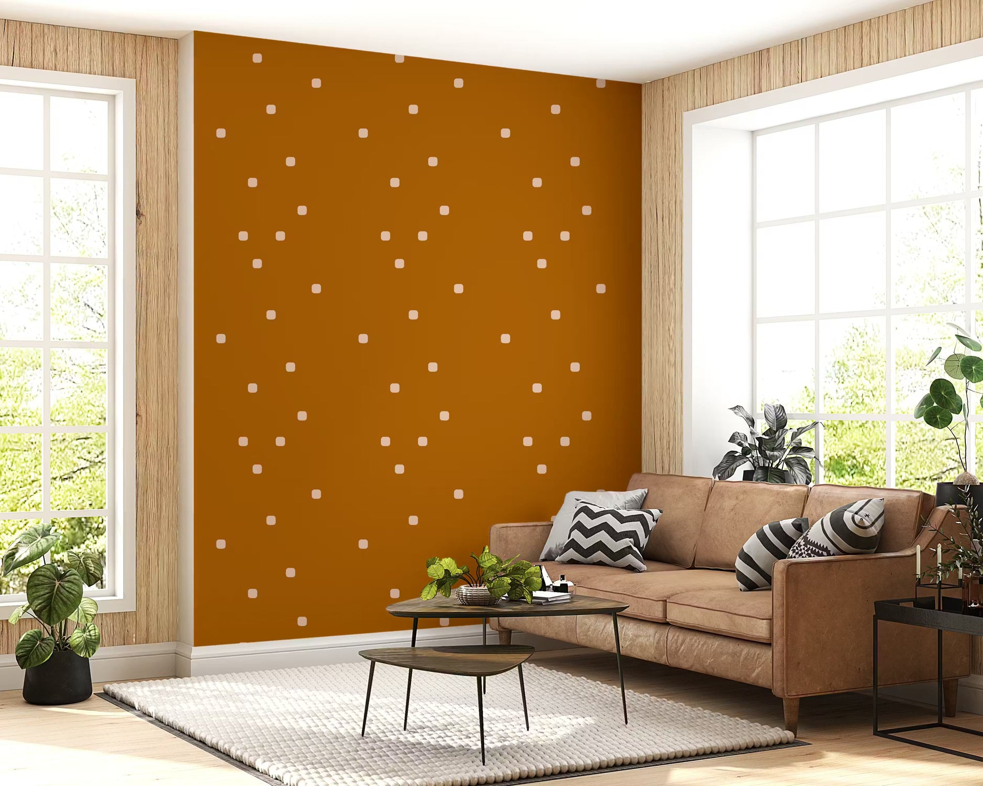 Beige and terracotta retro dot wallpaper across a living room accent wall. 
