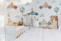 Whimsical animal racers wallpaper for kids' bedrooms

