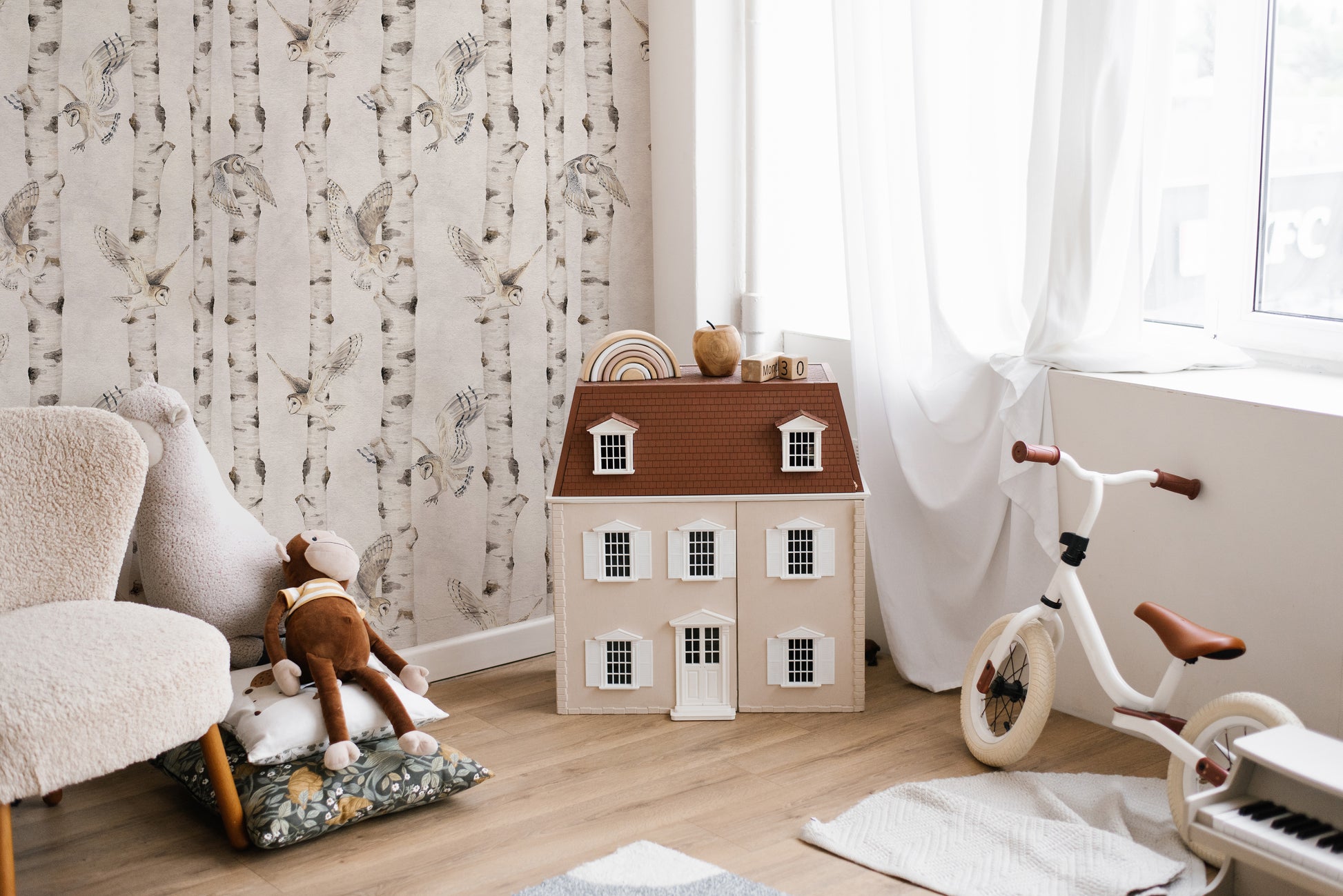 Elegant owls in a white birch forest
