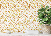 Brown and gold leaves on white base

