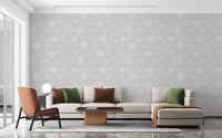 Gray wallpaper with snowflake pattern design
