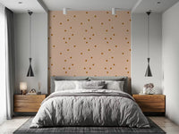 Minimal blush wallpaper showing scattered rust square dots in retro style.