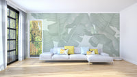 Chic green tropical mural with banana leaves
