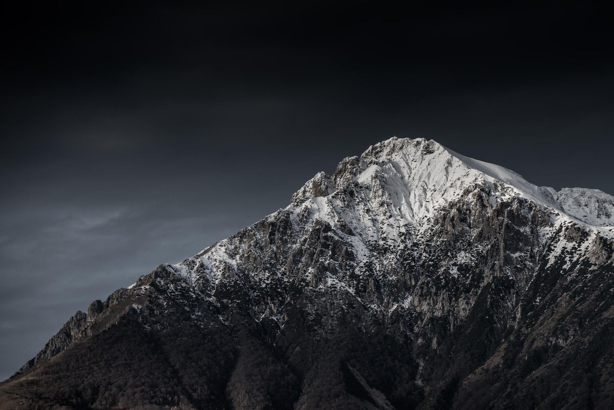 Dramatic Snowy Mountain View Wallpaper in your room — zoomed