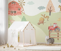 Cow with hay and wheelbarrow on the farm