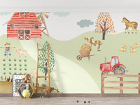 Farmyard tractor parked beside wooden fence