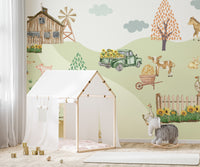 White lamb standing on grassy farm hill

