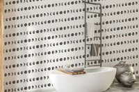 Gray and white lunar phases pattern on wallpaper