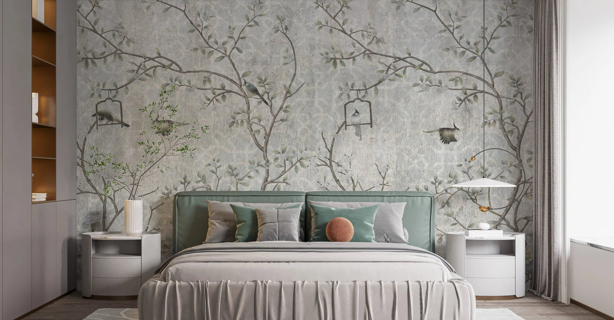 Modern bedroom with chinoiserie wallpaper, bed, and side tables.
