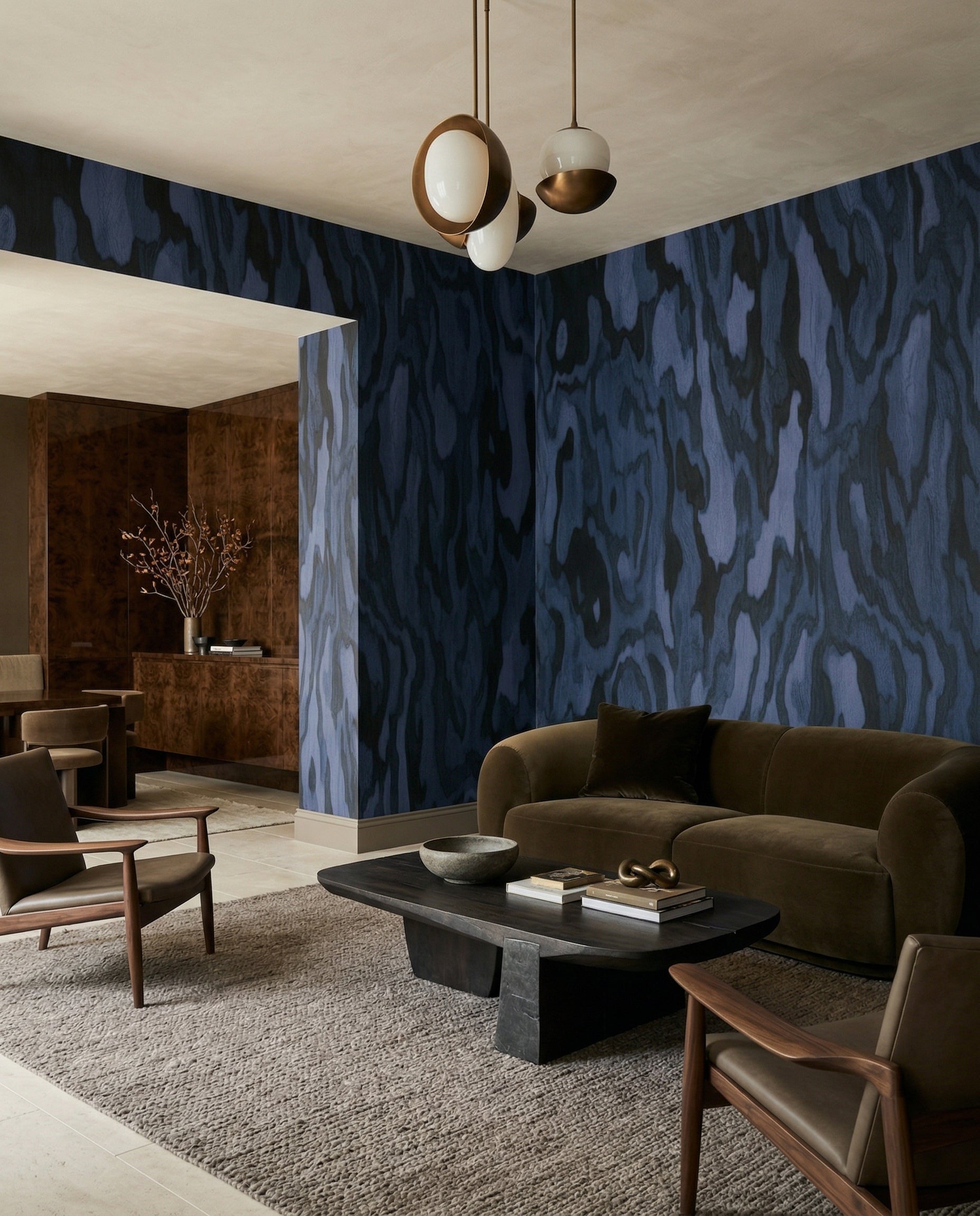 Blue burl wood wall mural displayed in a living room with natural texture., GD10373