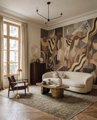 Interlocking geometric shapes and abstracted figures wall mural in brown olive and cream., GD10366