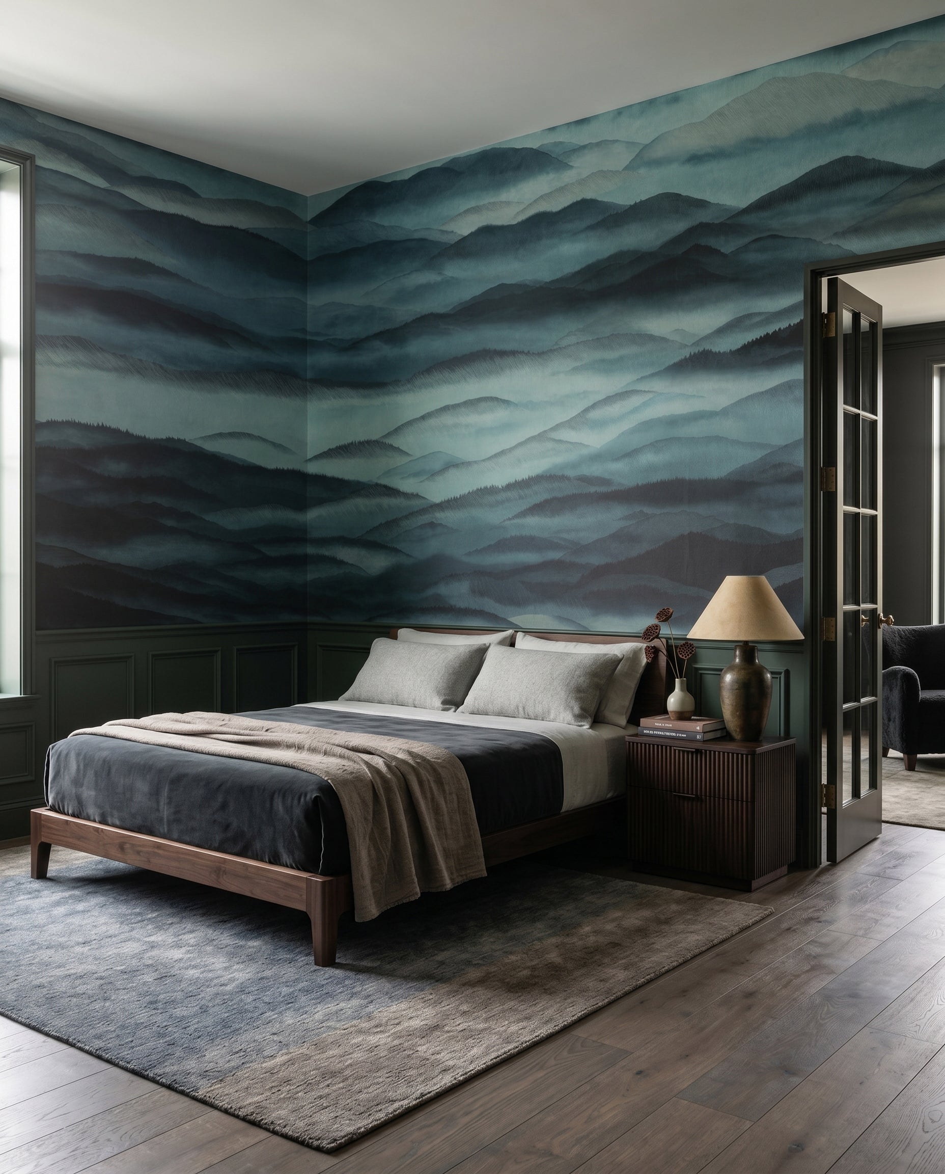 Dark teal mountain wall mural featured in a bedroom space., GD10380