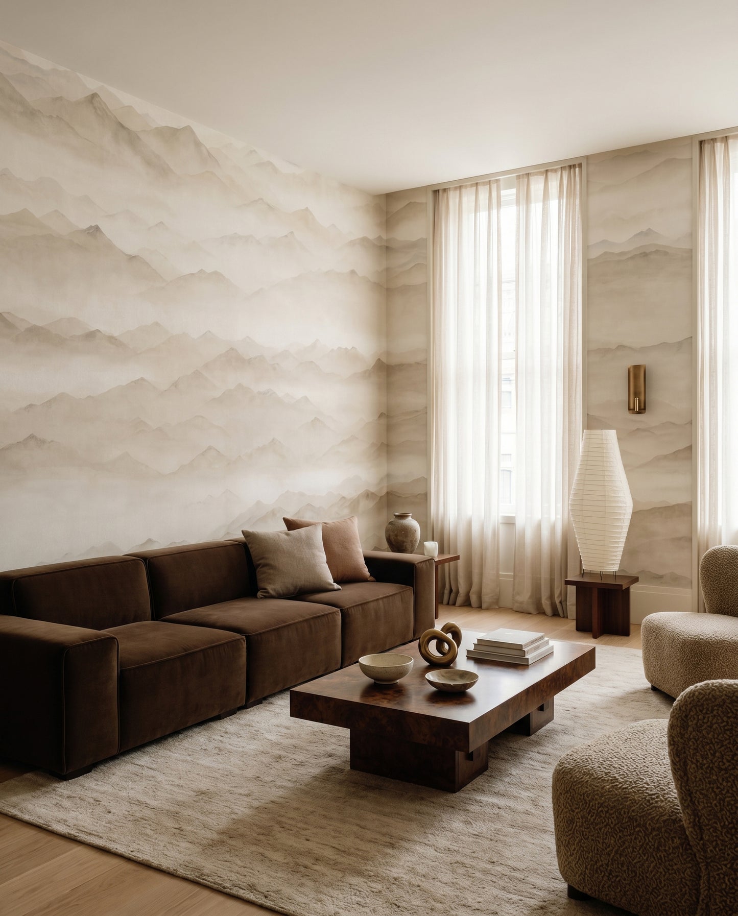 Wall mural with Soft fog drifting between layered mountain peaks in taupe., GD10379