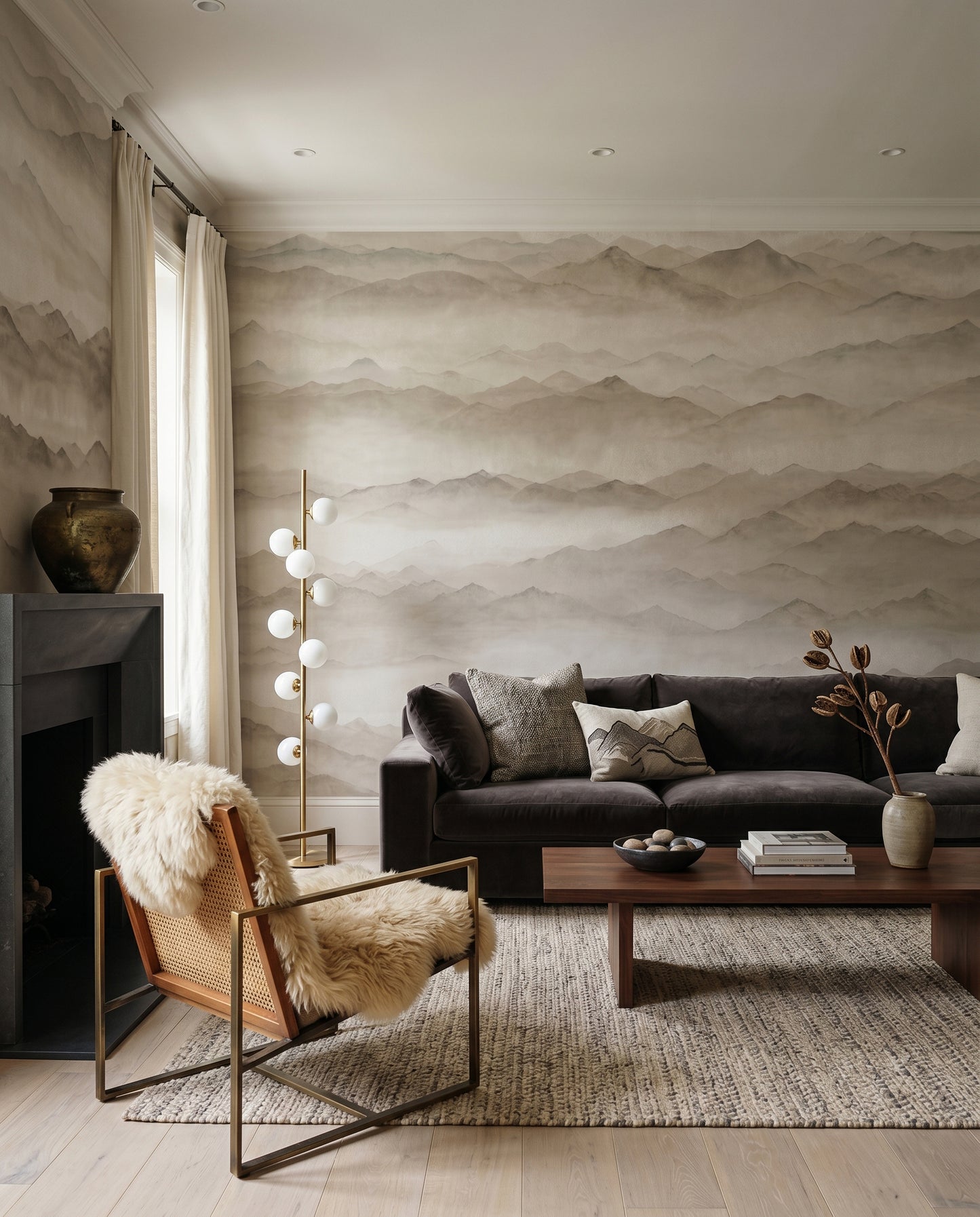 Muted landscape mural with overlapping ridge lines and mist in living  area., GD10379