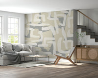 Abstract Terrain wall mural with earth tones in a minimalist bedroom.