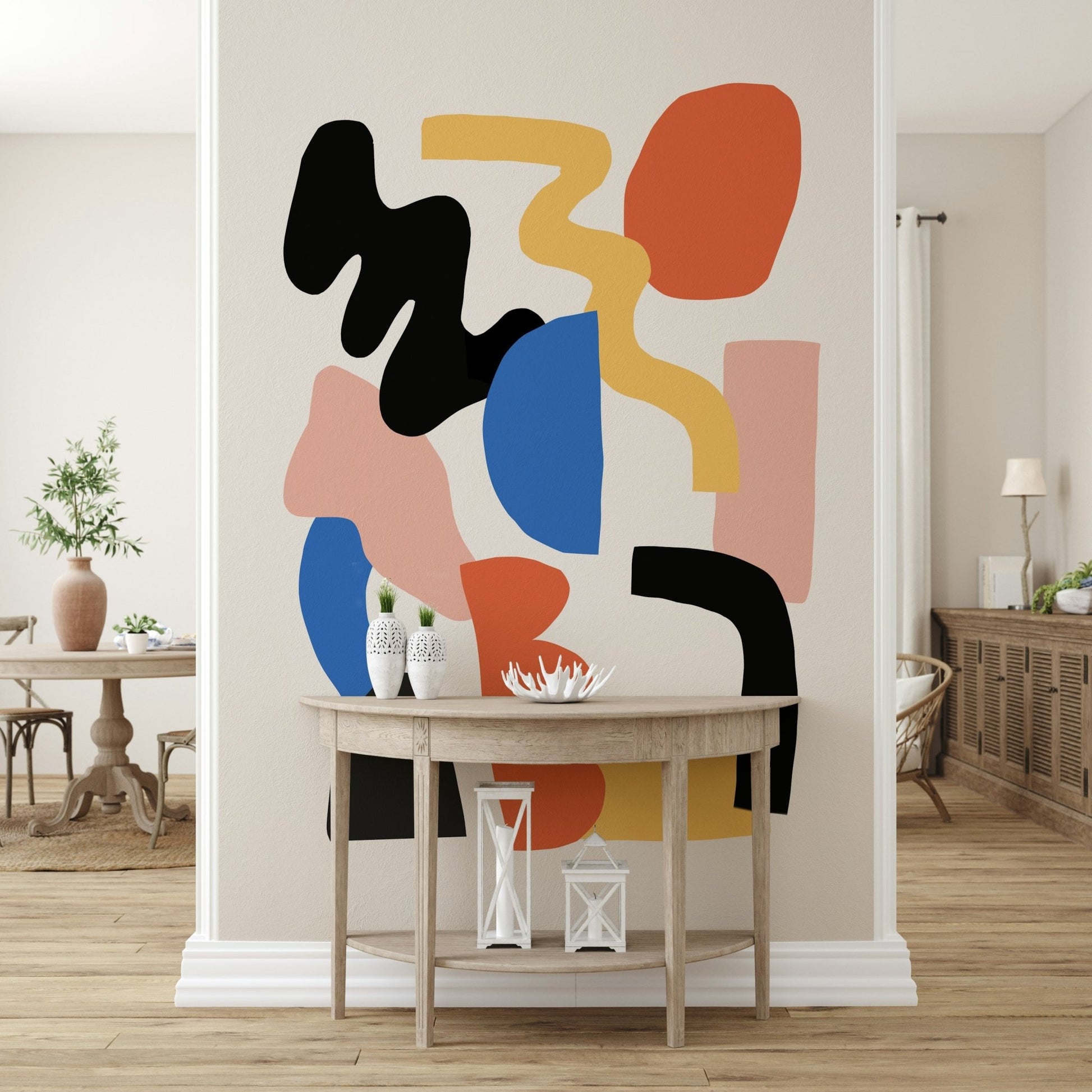 Minimalist furniture styled against the bold Block Party wallpaper.