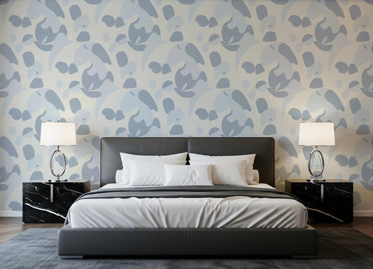 Bedroom setup where Abstract Blue Cat Wallpaper sits softly behind the bed frame