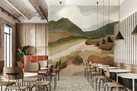 Bedroom decorated with abstract mountainscape mural

