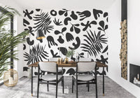 Dining room wall featuring Organic Foliage wall mural in monochrome tones