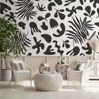 Crisp leaf silhouettes across Black and White wall mural design