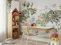 A living room featuring the animal map wall mural.

