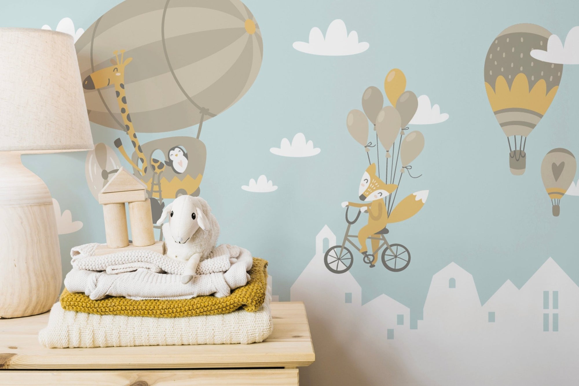 Playful fox and penguin balloon mural
 B010