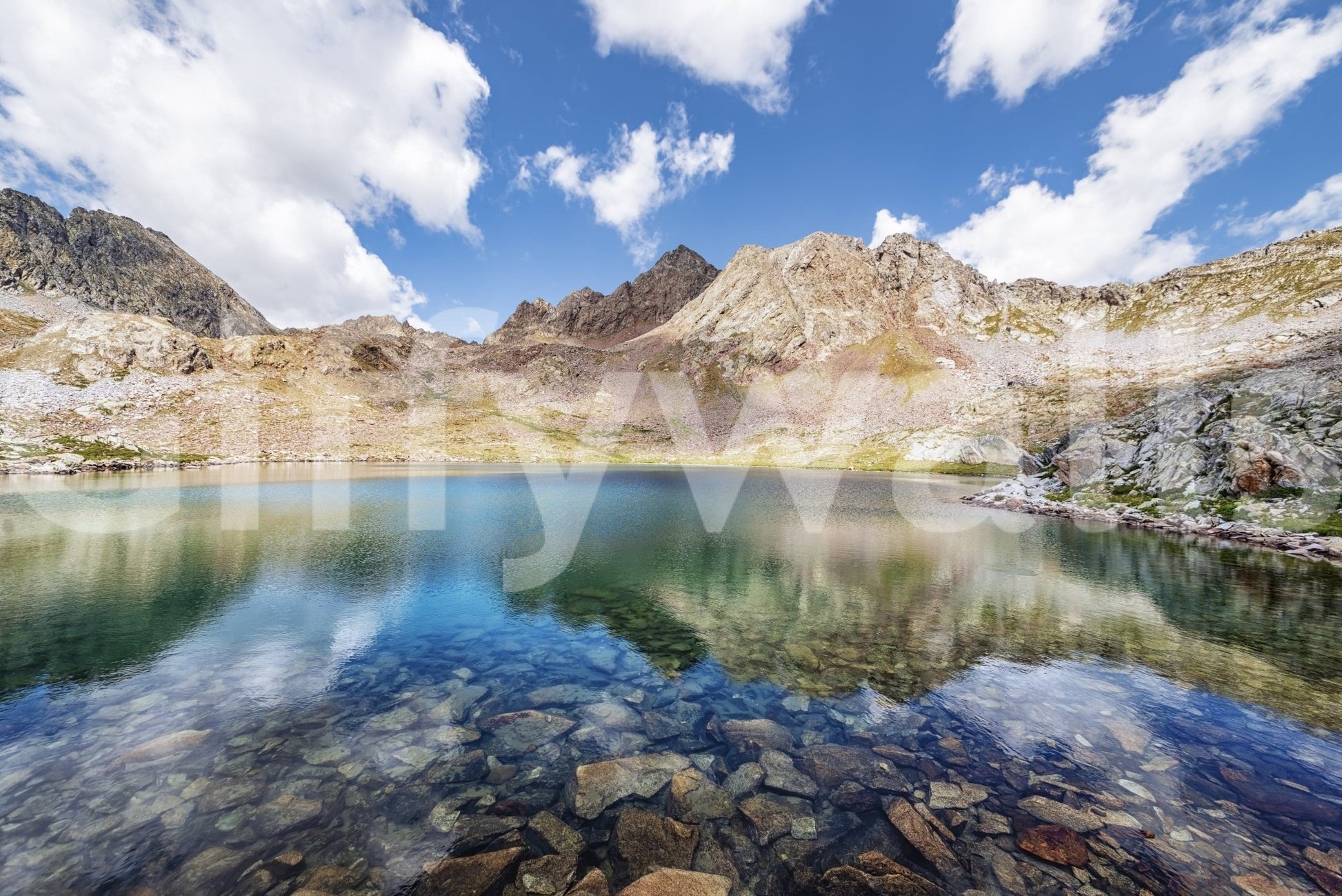 Alpine Azure wall mural with clear mountain lake reflections under a bright blue sky