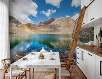 A bright breakfast nook feels fresher with Alpine Azure Wall Mural and blue water reflections