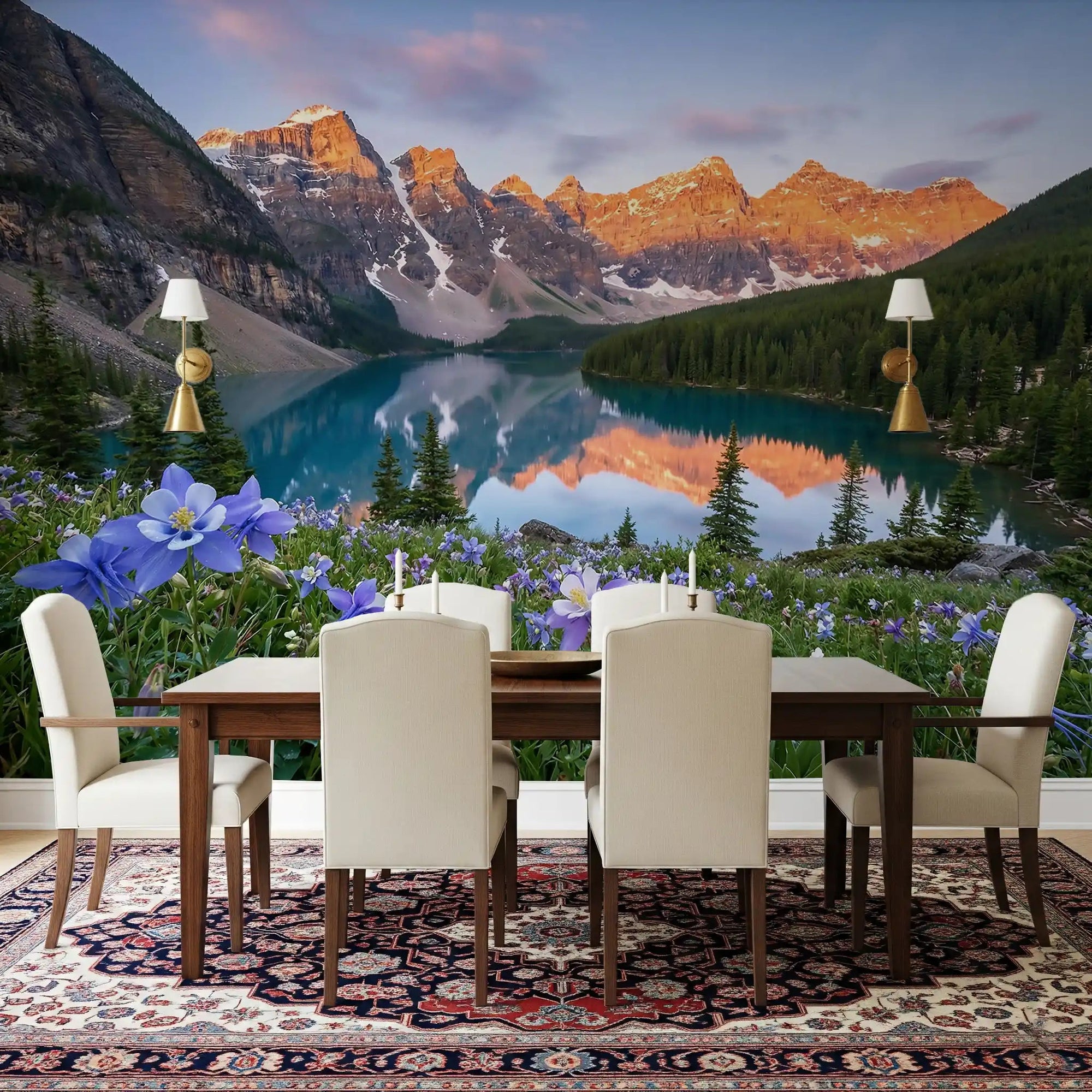 Glowing peaks rise across a dining room behind Alpine Glow Lakeside Blooms wall mural.GD9535