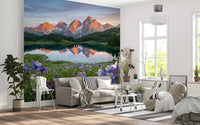 Wildflowers and mountains fill a Living room with Alpine Glow Reflection wall mural.GD9536