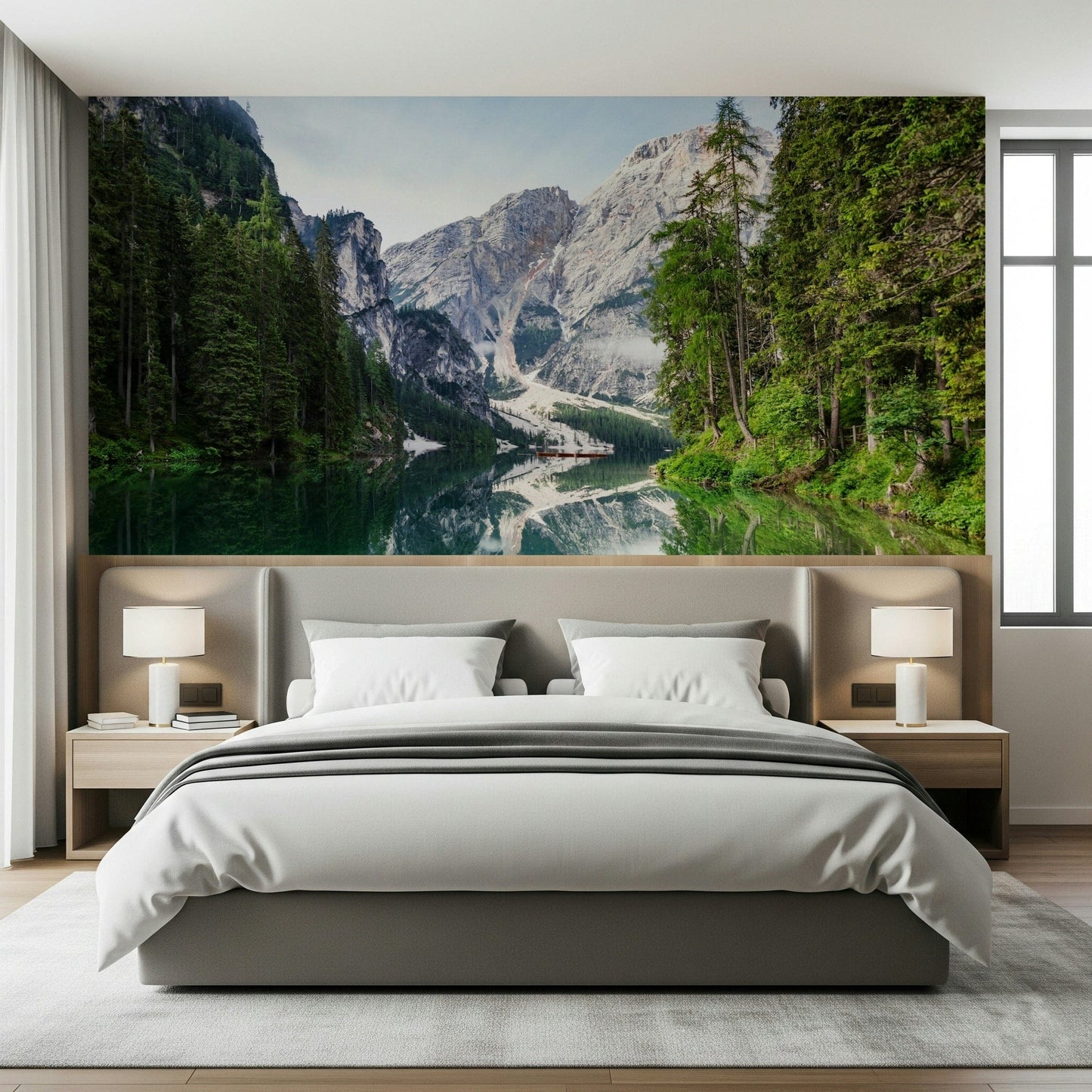 Behind the bed, Alpine Reflections Wall Mural creates a cool nature-led feature